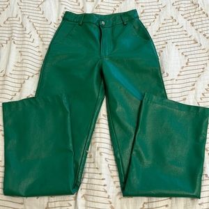 Stylish, green leather pants in a size extra small